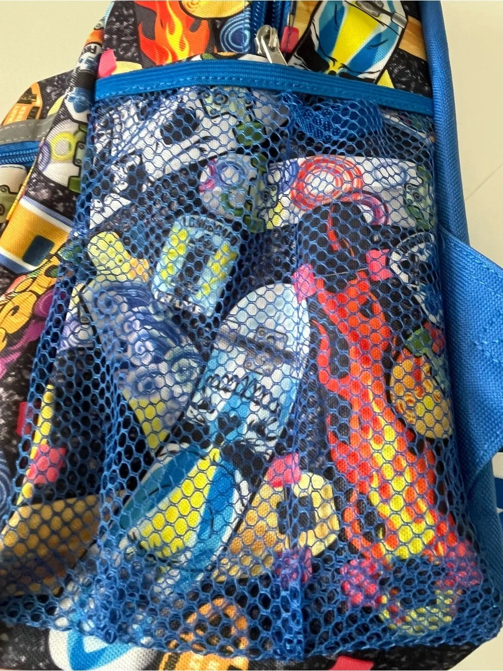 This Reboot Kids Blue Multi-Print Backpack - Fun Skateboard Pattern